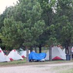 Tents and Tipis - Tent Area under Pines - Rush No More RV Resort and Cabins Sturgis SD